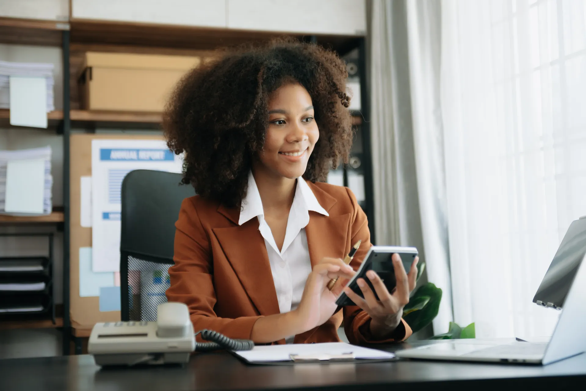 african-woman-freelancer-is-working-her-job-computer-tablet-laptop-doing-accounting-analysis-report-re